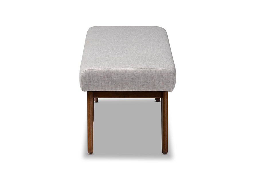 Baxton Studio Rika MidCentury Modern Greyish Beige Fabric Upholstered Walnut Brown Finished Boomerang Bench