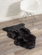 HomeRoots 2' X 3' Black New Zealand Natural Sheepskin Rug