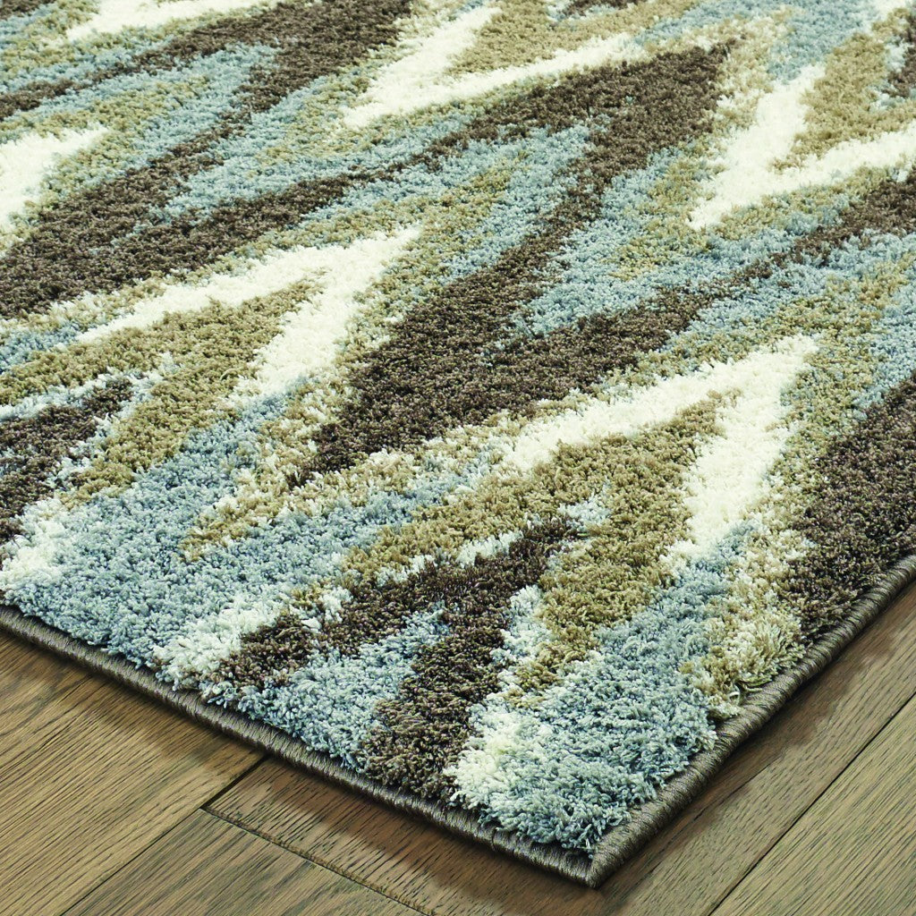 HomeRoots Grey Polyester 4’x6’ Gray and Taupe Ikat Pattern Area Rug