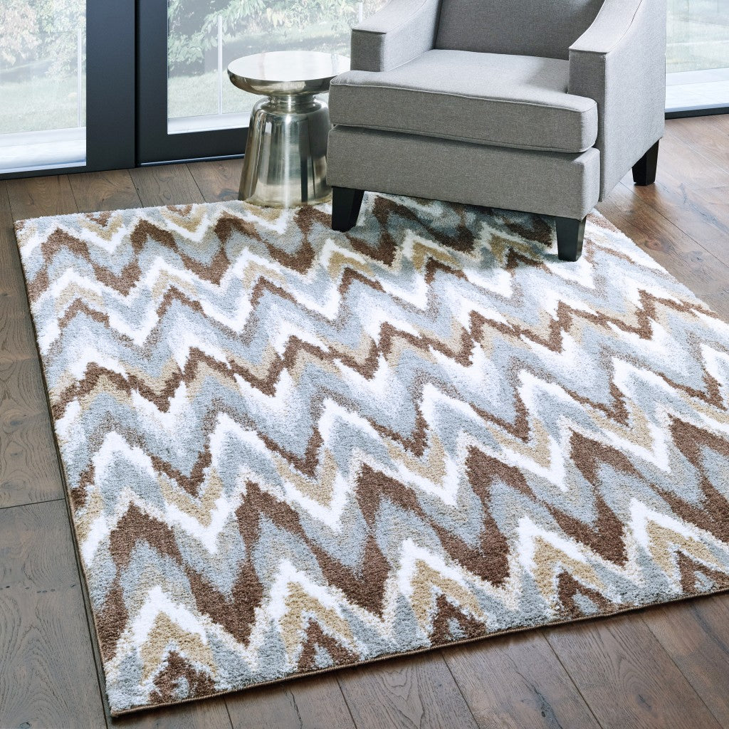 HomeRoots Grey Polyester 4’x6’ Gray and Taupe Ikat Pattern Area Rug