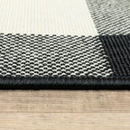 HomeRoots Polypropylene 2’x8’ Black and Ivory Gingham Indoor Outdoor Runner Rug