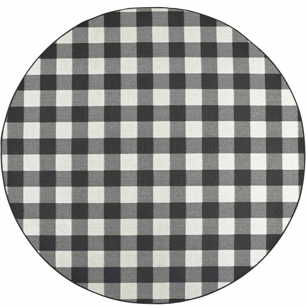 HomeRoots Polypropylene 8’ Round Black and Ivory Gingham Indoor Outdoor Area Rug