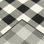 HomeRoots Polypropylene 8’ Round Black and Ivory Gingham Indoor Outdoor Area Rug
