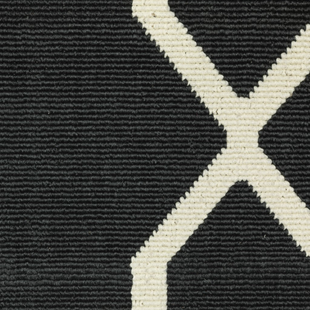 HomeRoots Polypropylene 5’x8’ Black and Ivory Trellis Indoor Outdoor Area Rug