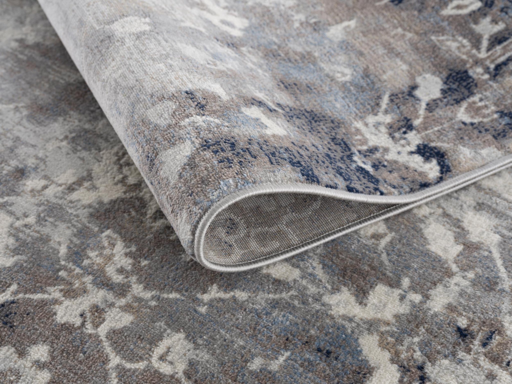 HomeRoots 100% Polypropylene 2’ x 8’ Navy and Beige Distressed Vines Runner Rug