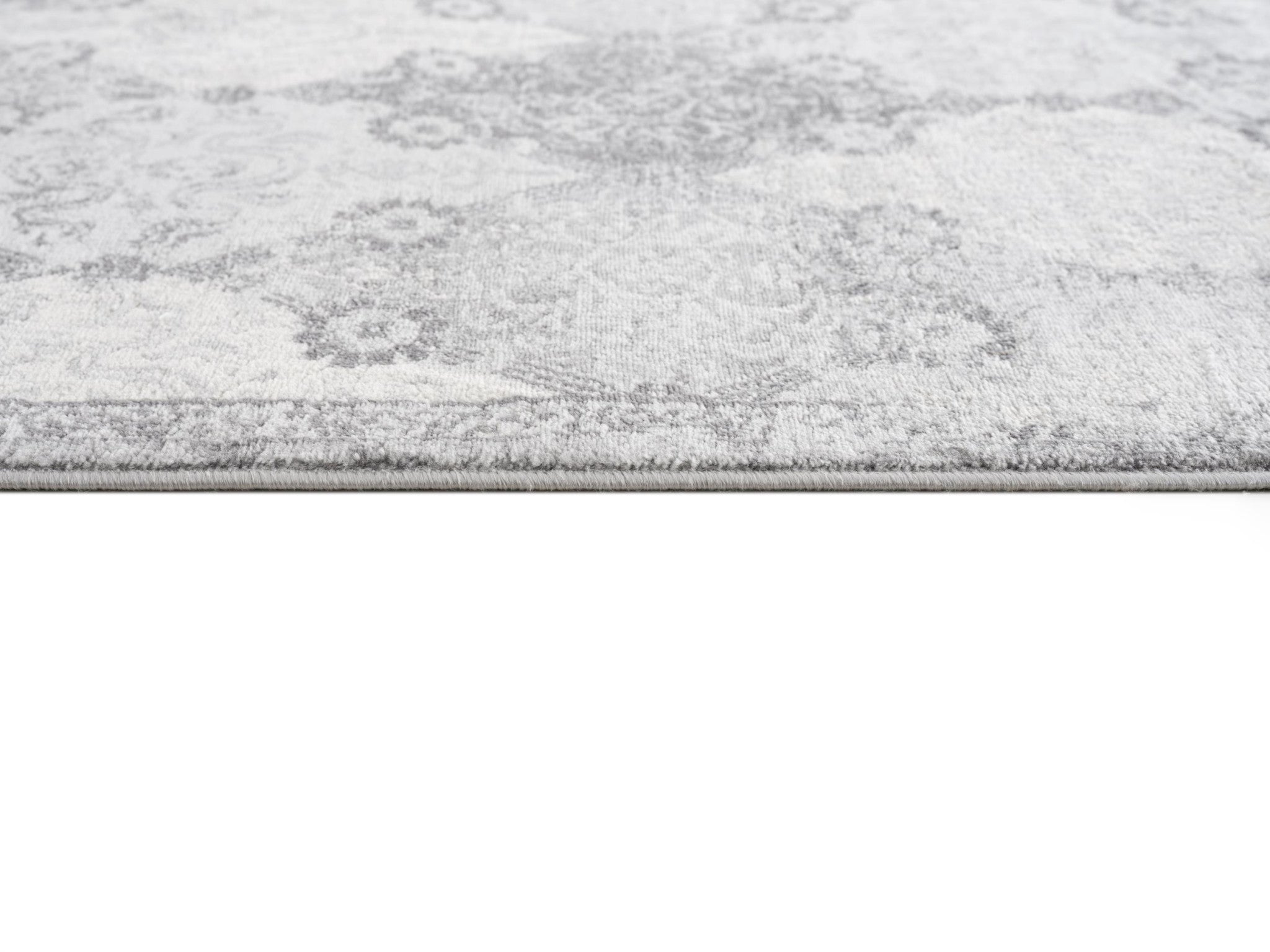HomeRoots Grey 100% Polypropylene 2’ x 5’ Gray Distressed Trellis Pattern Area Rug