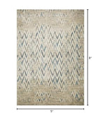 HomeRoots Ivory Heat-Set Polypropelene 5’ x 8’ Beige Blue Distressed Chevron Area Rug