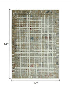 HomeRoots Shrink Polyester 4’ x 6’ Ivory Khaki Distressed Plaid Area Rug