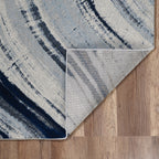 HomeRoots Ivory/Blue Heat-Set Polypropelene 5’ x 8’ Navy Ivory Abstract Strokes Modern Area Rug
