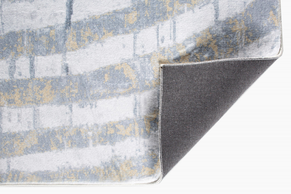 HomeRoots Grey/Gold Polyester 8’ x 10’ Gray Distressed Steps Abstract Area Rug