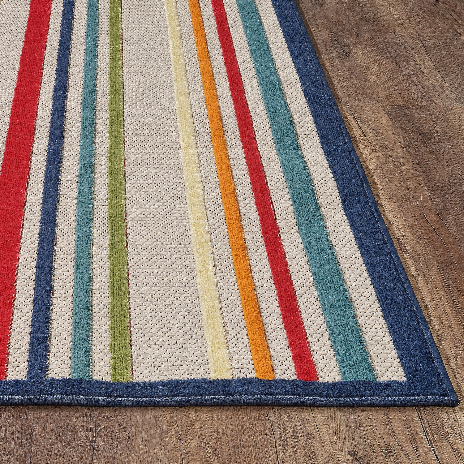HomeRoots Ivory UV-Treated Polypropylene 5’ x 7’ Navy Colorful Striped Indoor Outdoor Area Rug
