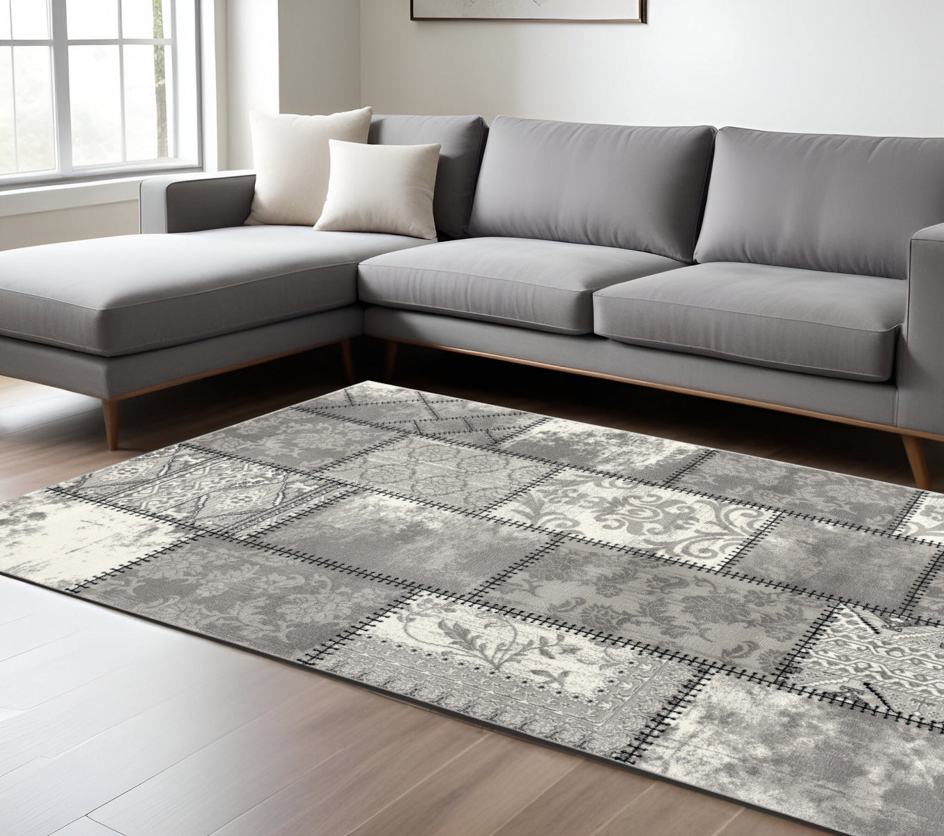 7 X 9 Gray and Ivory Damask Power Loom Area Rug