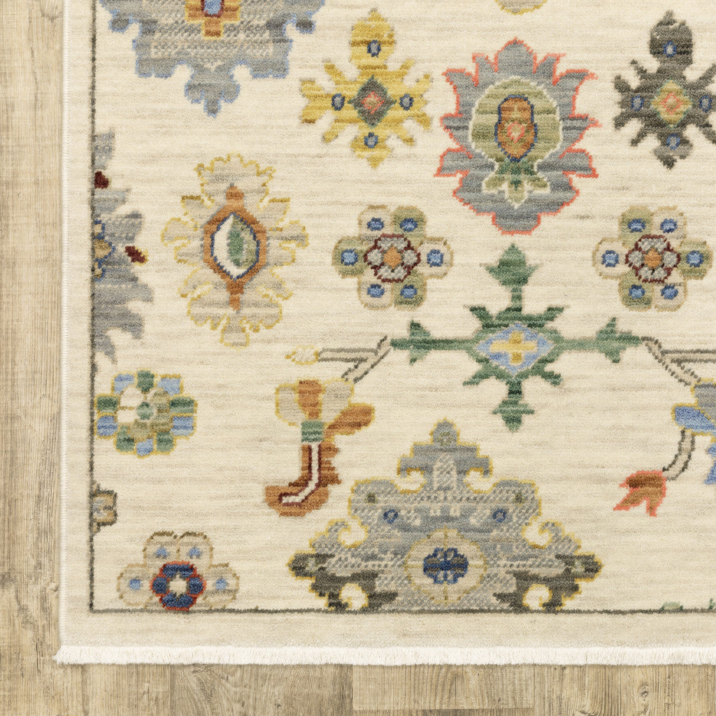 HomeRoots 509328 6 x 9 ft. Ivory Beige Gold Gray Blue Pink Red Rust & Green Oriental Power Loom Stain Resistant Rectangle Area Rug with Fringe