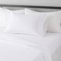 Amazon Basics Lightweight Super Soft Easy Care Microfiber 3-Piece Bed Sheet Set with 14-Inch Deep Pockets, Twin XL, Bright White