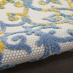 HomeRoots Ivory Blue 100% Polypropylene 4’ x 6’ Ivory and Blue Indoor Outdoor Area Rug