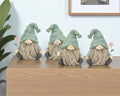 Set of Four Brown And Green Polyresin Gnomes