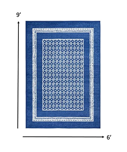 HomeRoots 100% Polypropylene 6’ x 9’ Navy and Ivory Geometric Area Rug