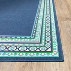 HomeRoots Polypropylene 8’ Round Navy and Green Geometric Indoor Outdoor Area Rug