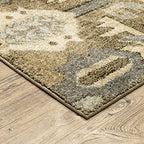 HomeRoots Polypropylene 5’ x 8’ Tan and Gold Central Medallion Indoor Area Rug