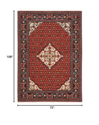 HomeRoots 509218 6 x 9 ft. Red Blue Ivory & Orange Oriental Power Loom Stain Resistant Rectangle Area Rug with Fringe