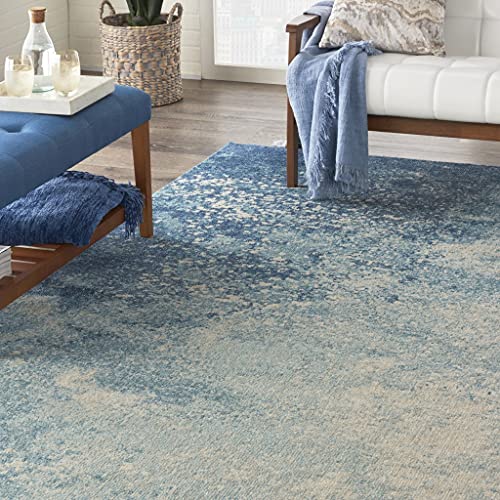 HomeRoots Navy/Light Blue 100% Polypropylene 7’ x 10’ Light Blue and Ivory Abstract Sky Area Rug