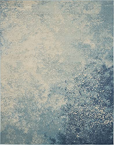 HomeRoots Navy/Light Blue 100% Polypropylene 7’ x 10’ Light Blue and Ivory Abstract Sky Area Rug