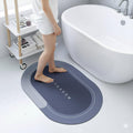RASHARSH Oval Shaped Bathroom and Kitchen Door Mat, NonSlip Floor Mat with Decorative Border