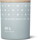 Skandinavisk Y Island Mini Scented Candle. Fragrance Notes: Crabapple and Dog Rose, Water Mosses and Green Leaves. 2.3 oz.