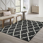HomeRoots Polypropylene 7’x10’ Black and Ivory Trellis Indoor Outdoor Area Rug