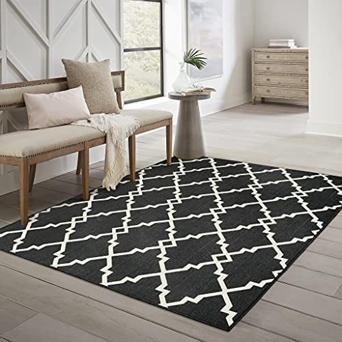 HomeRoots Polypropylene 5’x8’ Black and Ivory Trellis Indoor Outdoor Area Rug