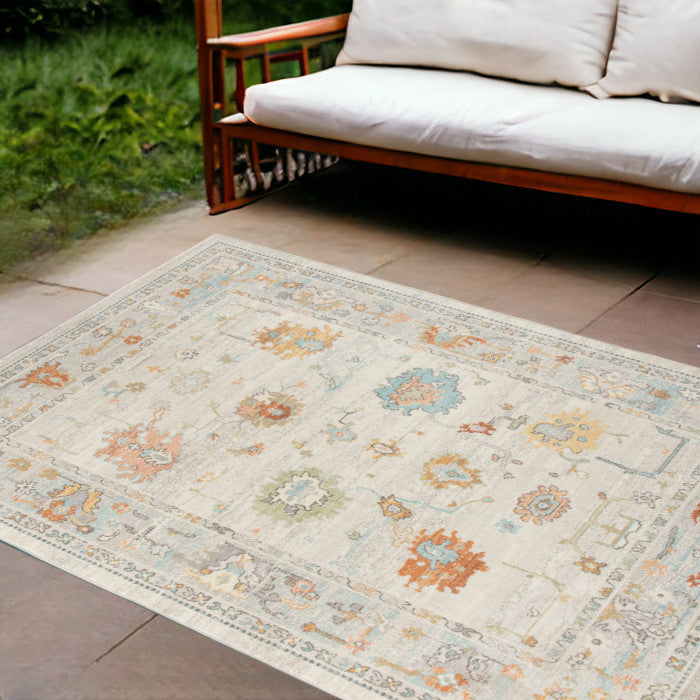 9' X 12' Blue And Orange Floral Stain Resistant Indoor Outdoor Area Rug