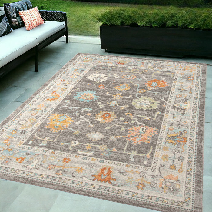 5' X 7' Gray And Orange Floral Stain Resistant Indoor Outdoor Area Rug