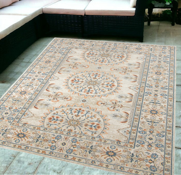 5' X 7' Blue And Orange Medallion Stain Resistant Indoor Outdoor Area Rug