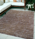 6' X 9' Brown And Ivory Striped Stain Resistant Indoor Outdoor Area Rug