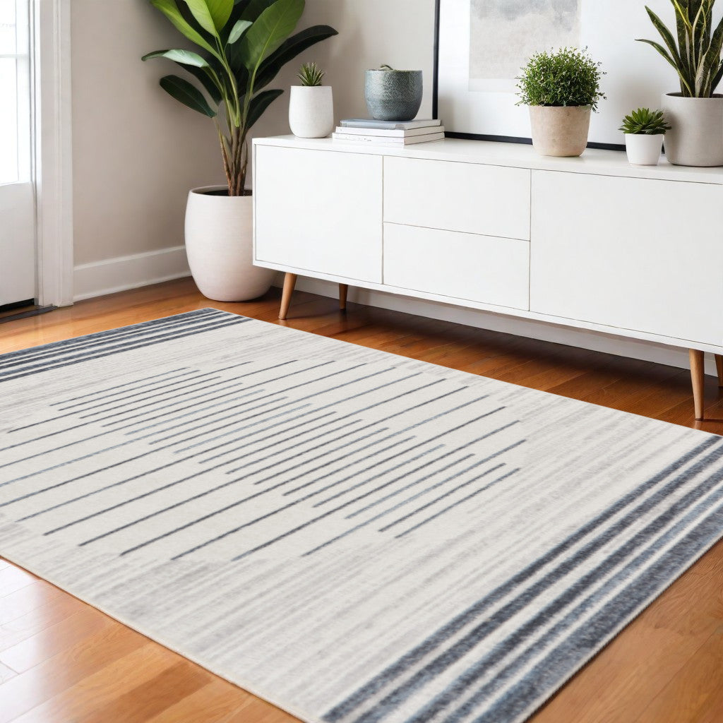 4 X 6 Ivory And Blue Geometric Washable Area Rug