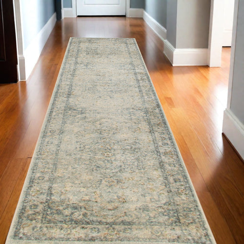 10' Blue And Ivory Floral Medallion Distressed Washable Runner Rug
