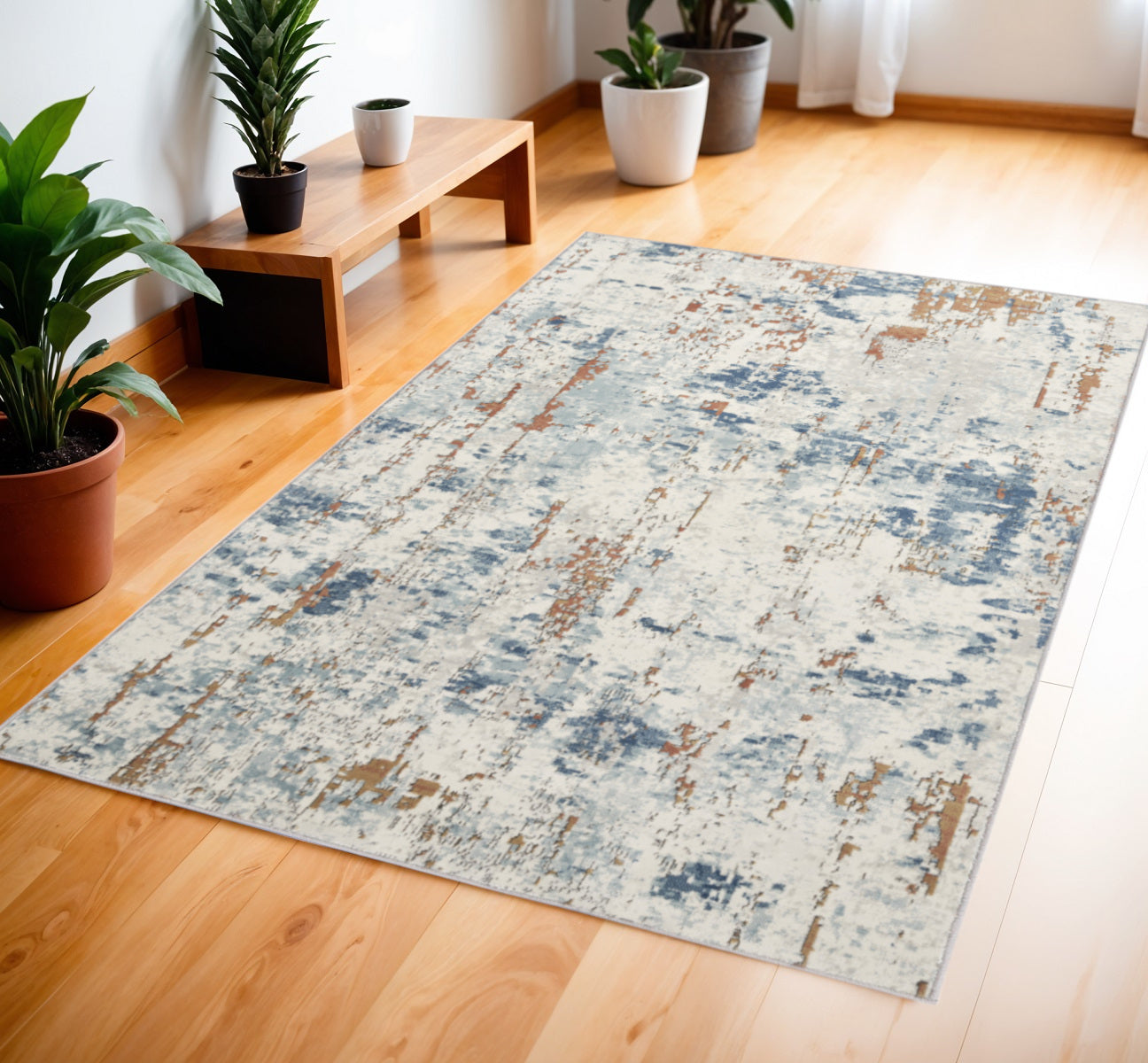 4' X 6' Beige and Blue Abstract Power Loom Area Rug