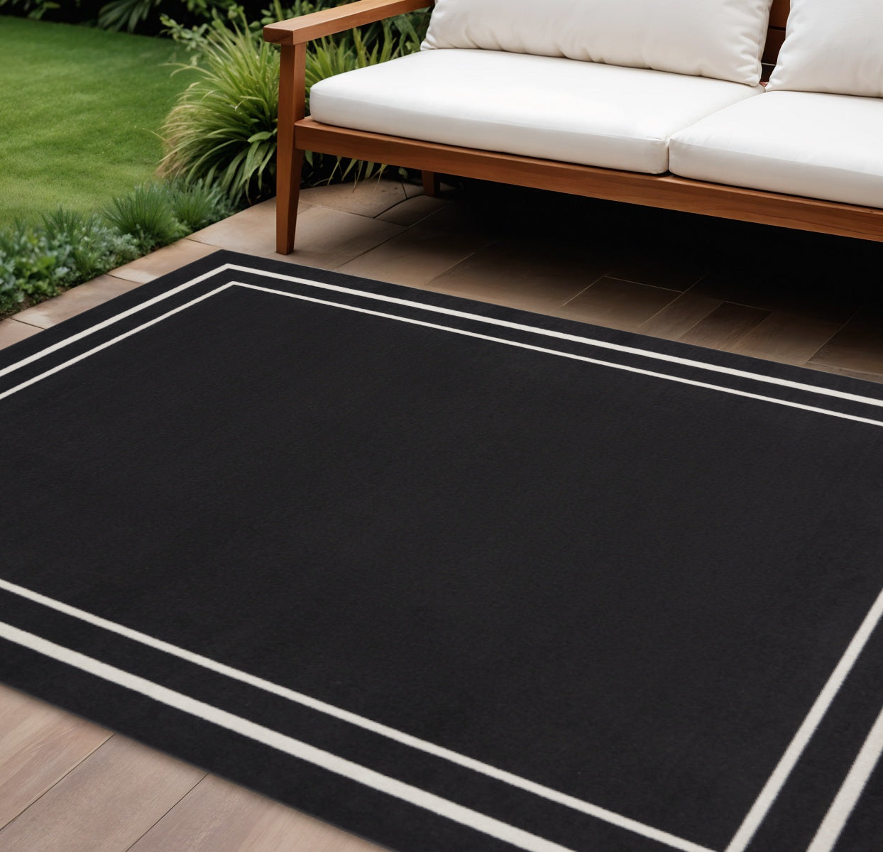 10 X 14 Black And Ivory Indoor Outdoor Area Rug