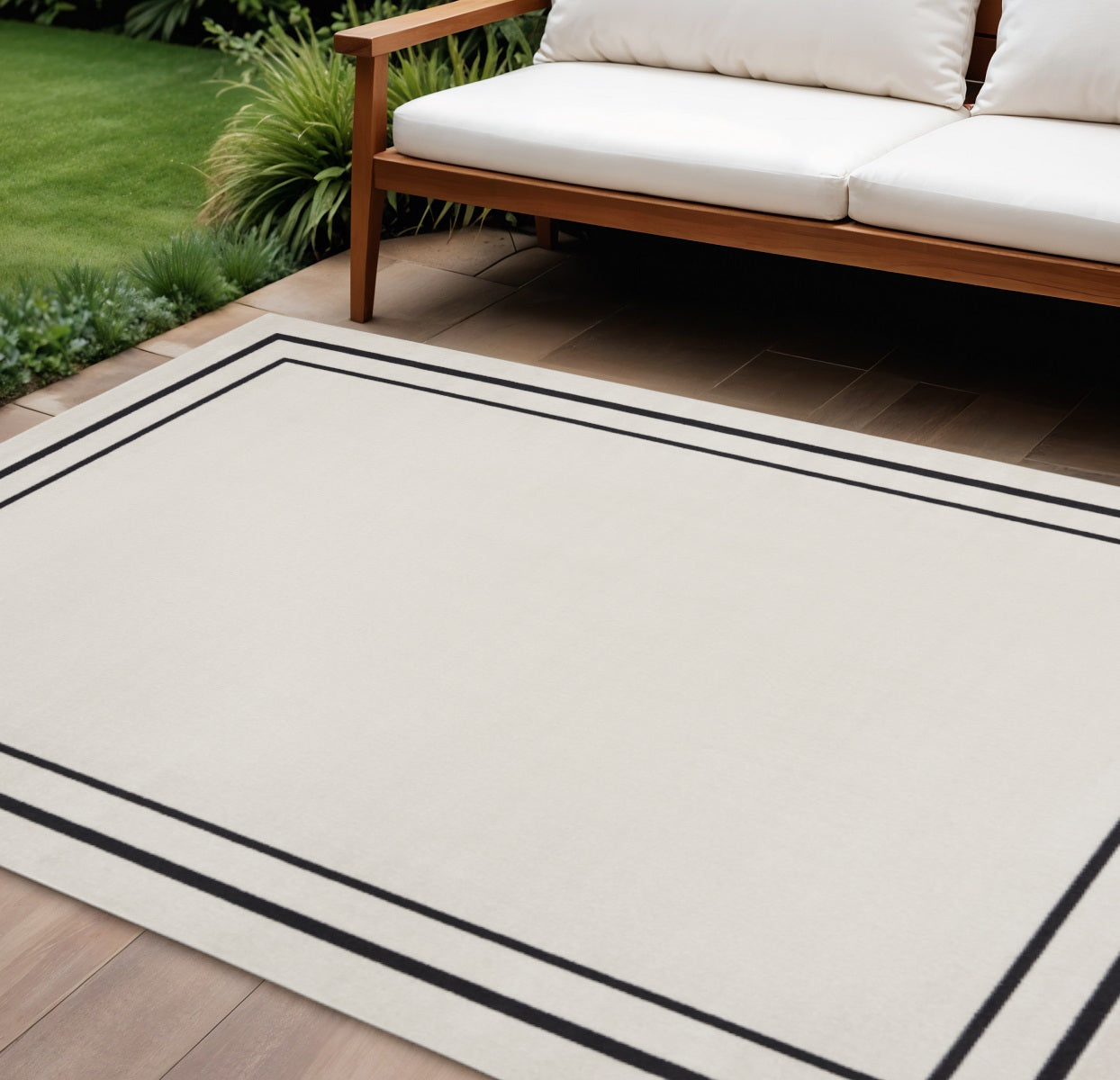 10 X 14 Ivory And Black Indoor Outdoor Area Rug