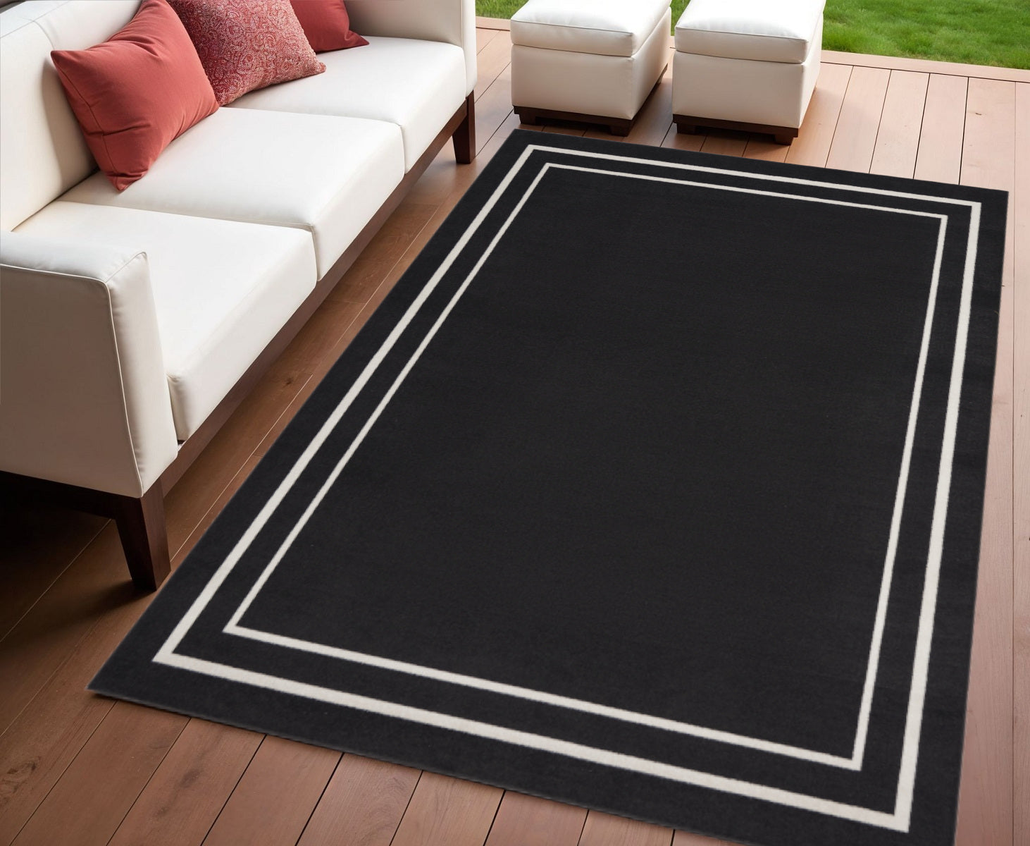 4 X 6 Black And Ivory Indoor Outdoor Area Rug