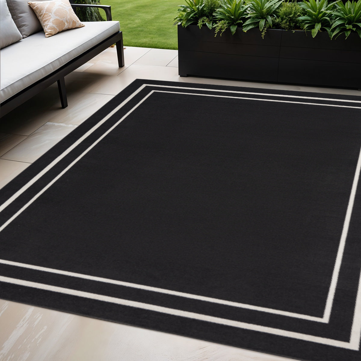 5 X 7 Black And Ivory Indoor Outdoor Area Rug