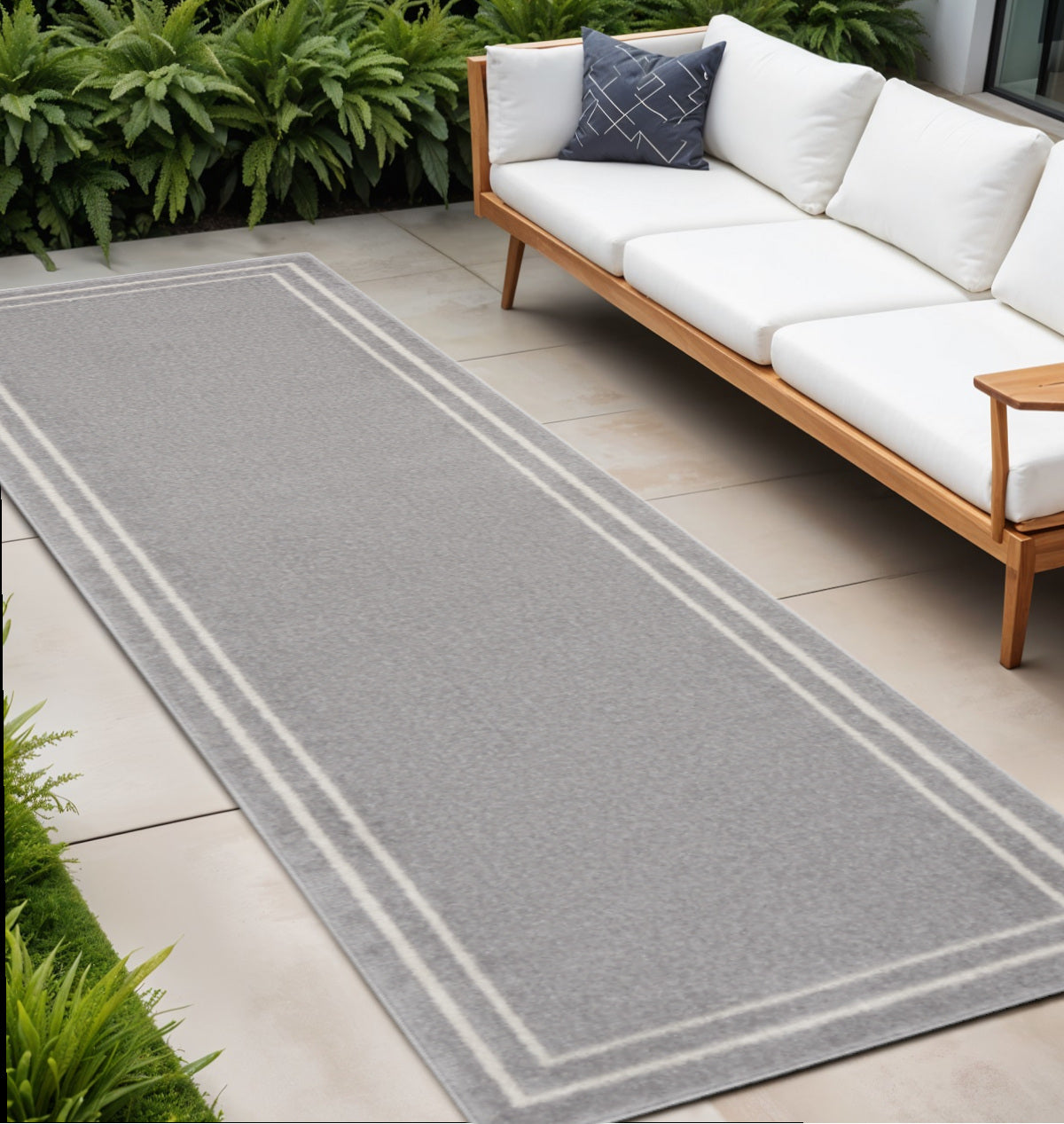 8 Gray And Ivory Indoor Outdoor Runner Rug