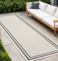 8 Ivory And Black Indoor Outdoor Runner Rug
