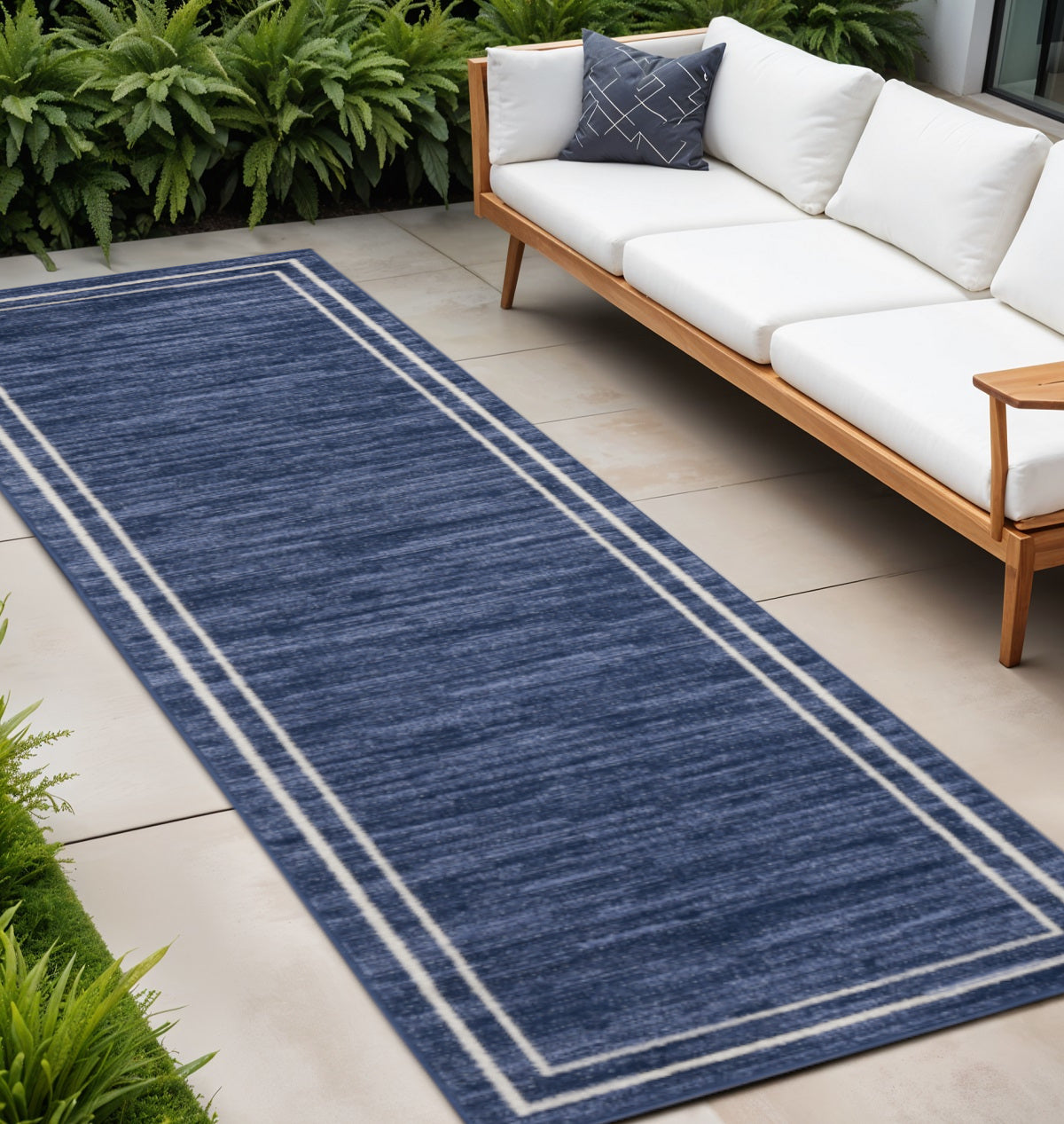 8 Navy Blue And Ivory Indoor Outdoor Runner Rug