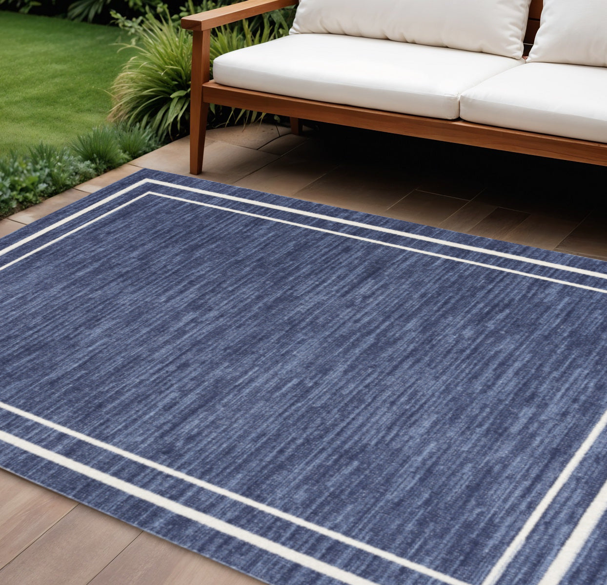 6 X 9 Navy Blue And Ivory Indoor Outdoor Area Rug
