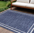 8 X 10 Navy Blue And Ivory Indoor Outdoor Area Rug
