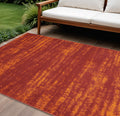 6 X 9 Red And Orange Abstract Indoor Outdoor Area Rug