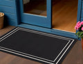 2 X 4 Black And Ivory Indoor Outdoor Area Rug