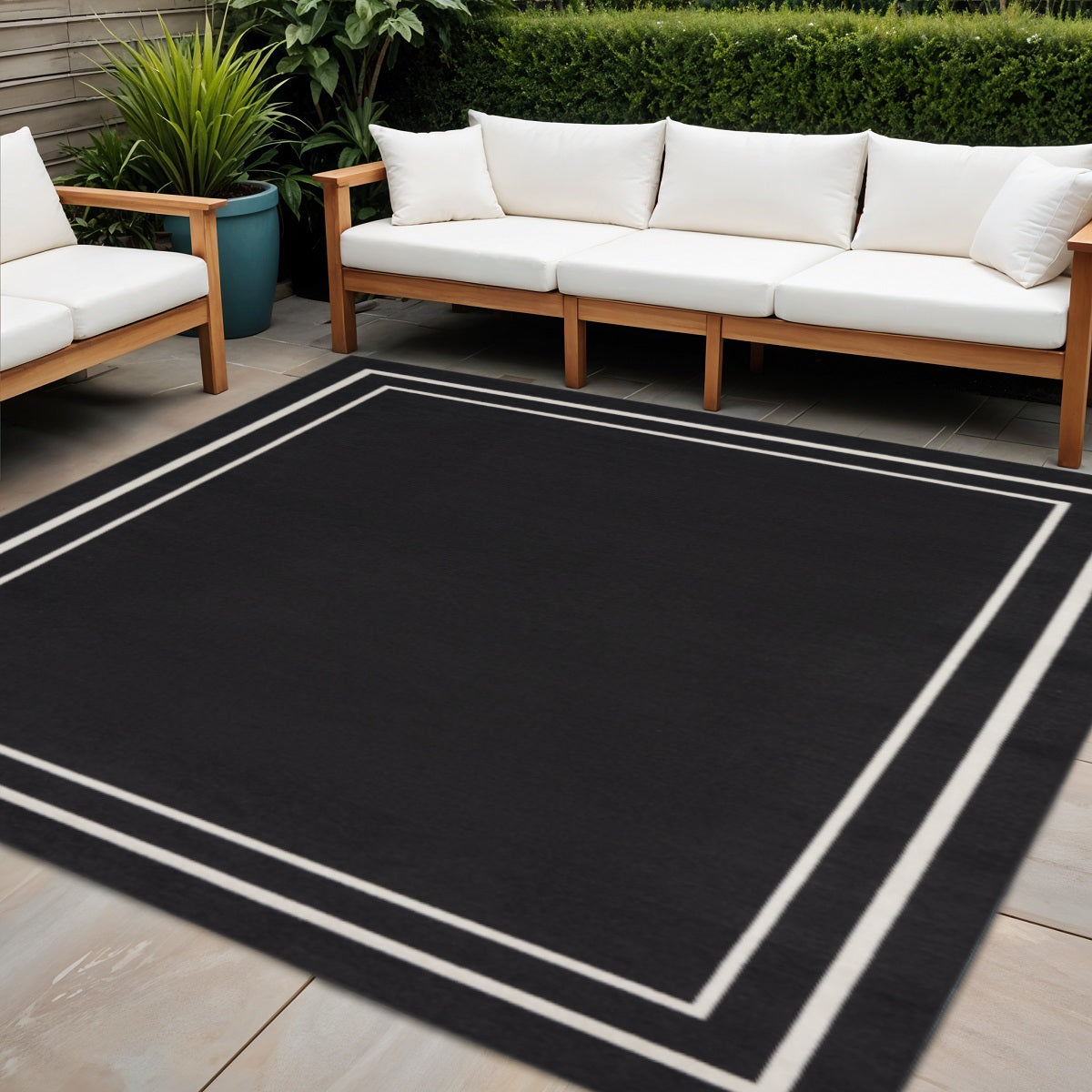 5 Black And Ivory Square Indoor Outdoor Area Rug