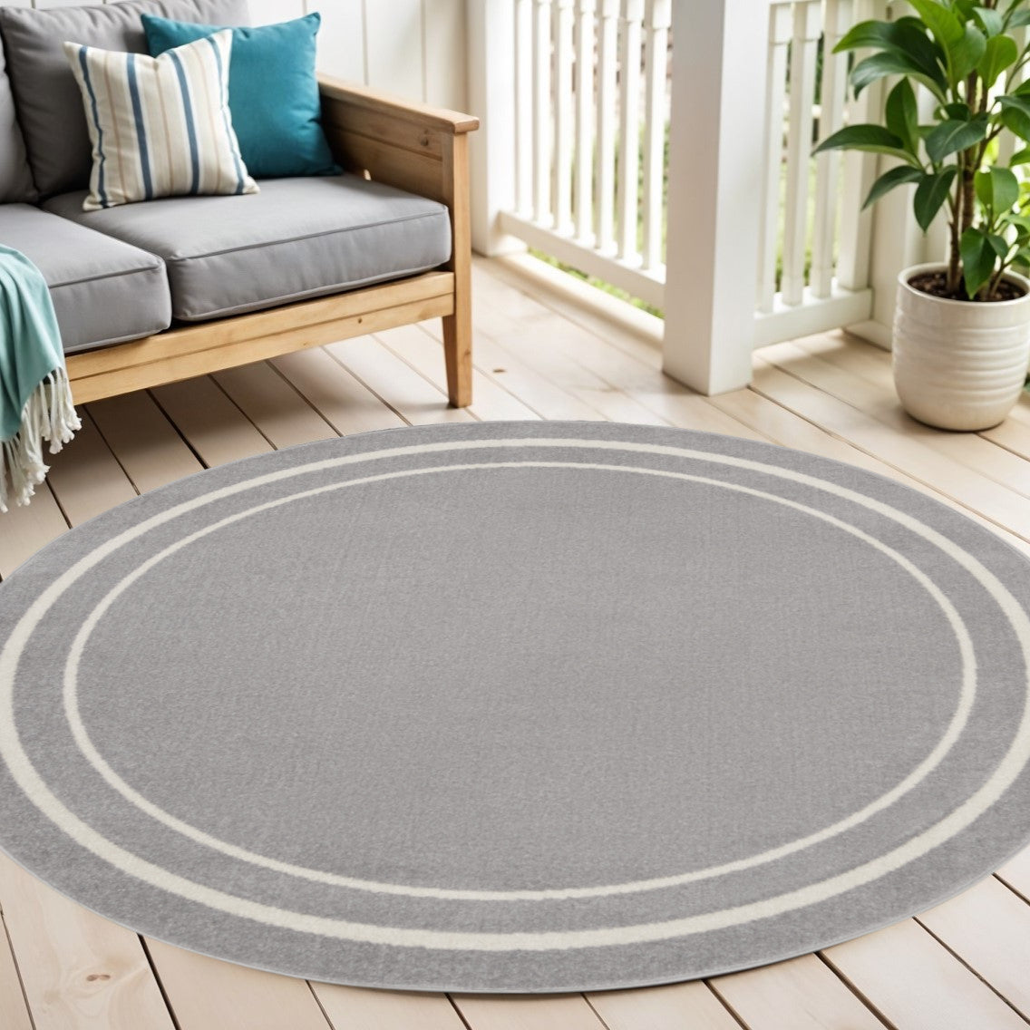 4 Gray And Ivory Round Indoor Outdoor Area Rug